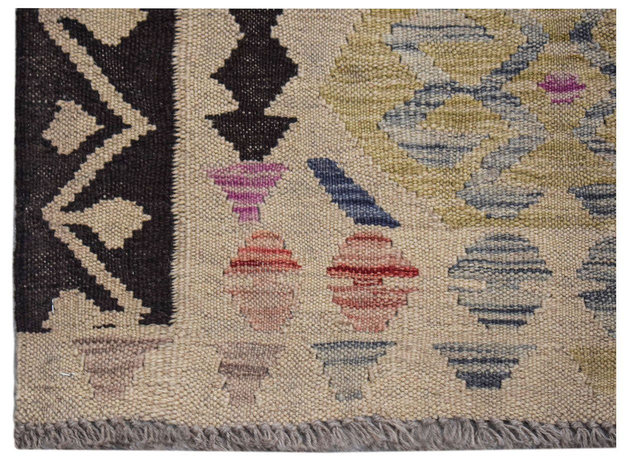 Afghan Maimana Kilim with geometric patterns in brown, beige, and colorful accents.