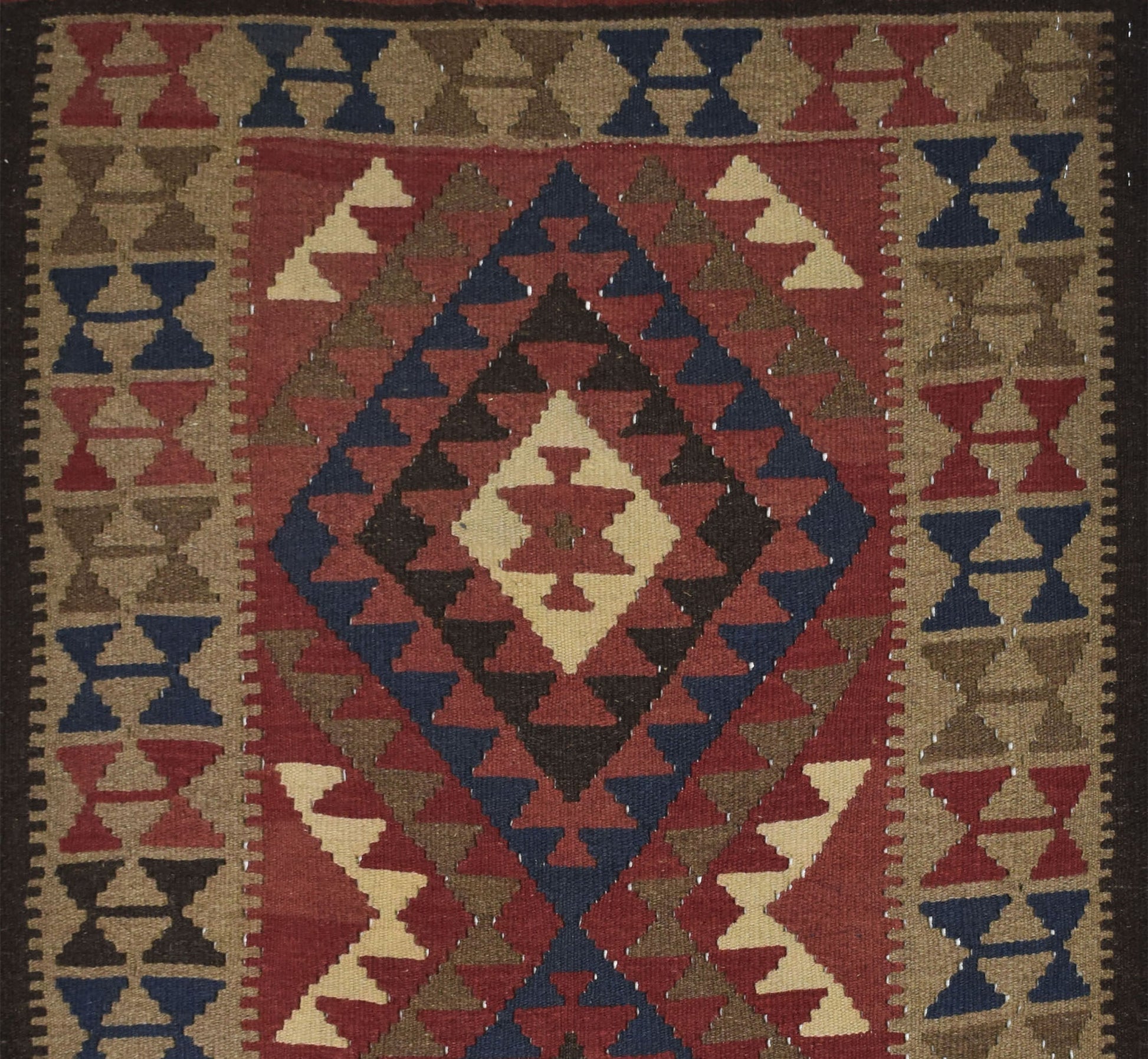 Handmade Afghan Maimana kilim rug featuring a geometric diamond pattern in red, blue, and tan.