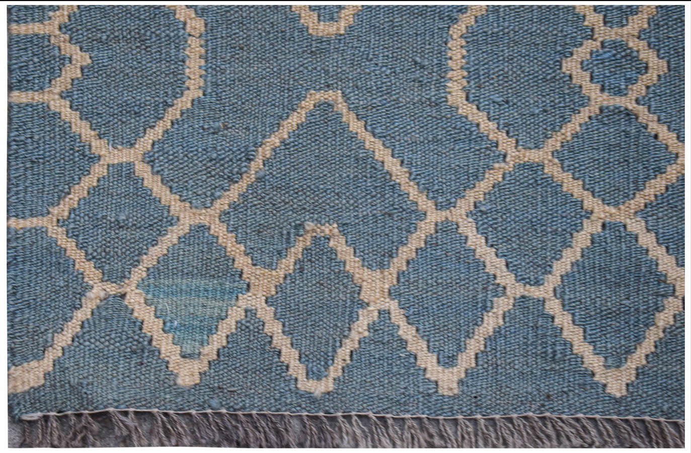 Afghan Maimana Kilim with a blue and cream geometric diamond pattern.