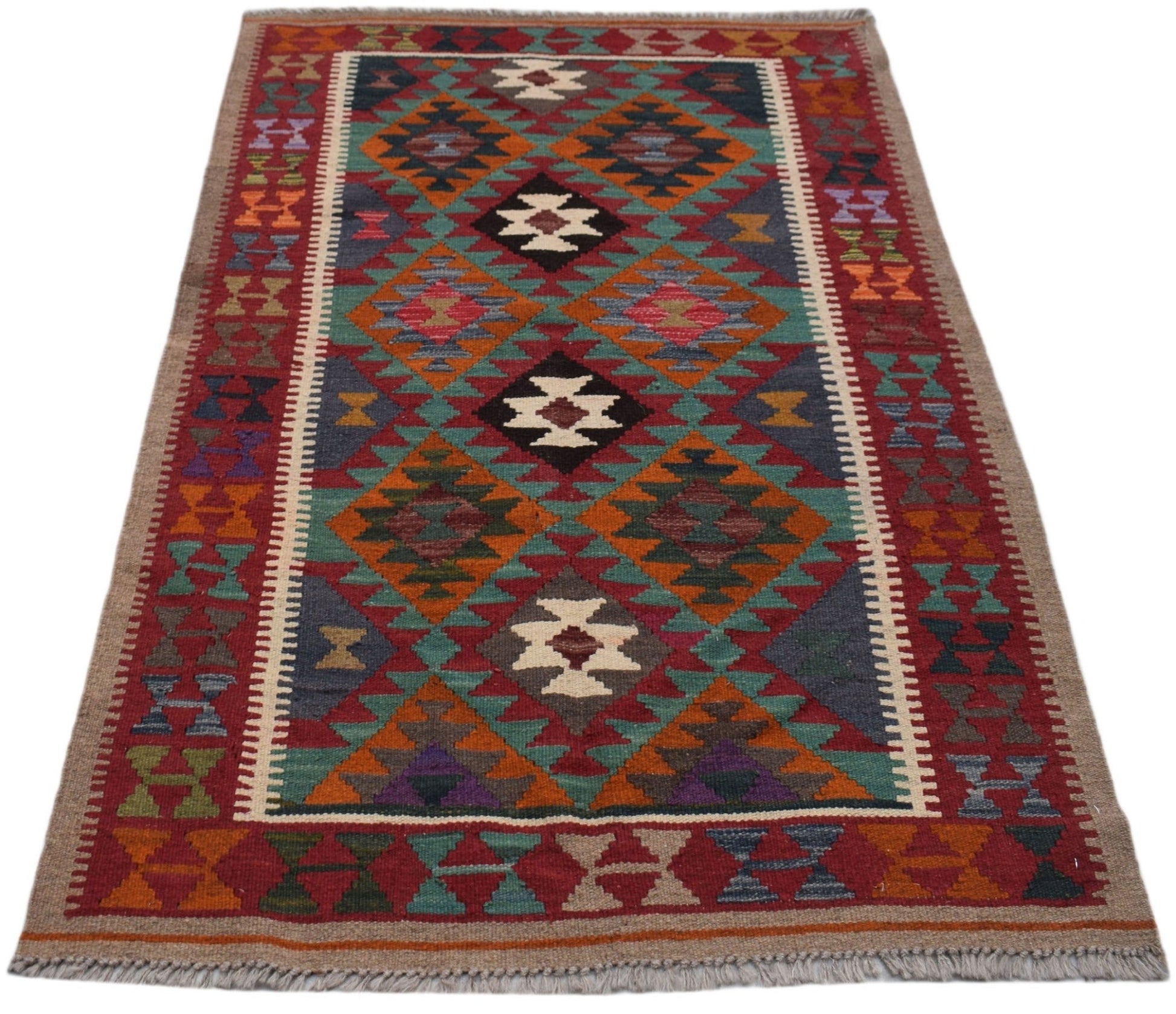 Handwoven Afghan Maimana kilim rug featuring a colorful geometric diamond pattern.