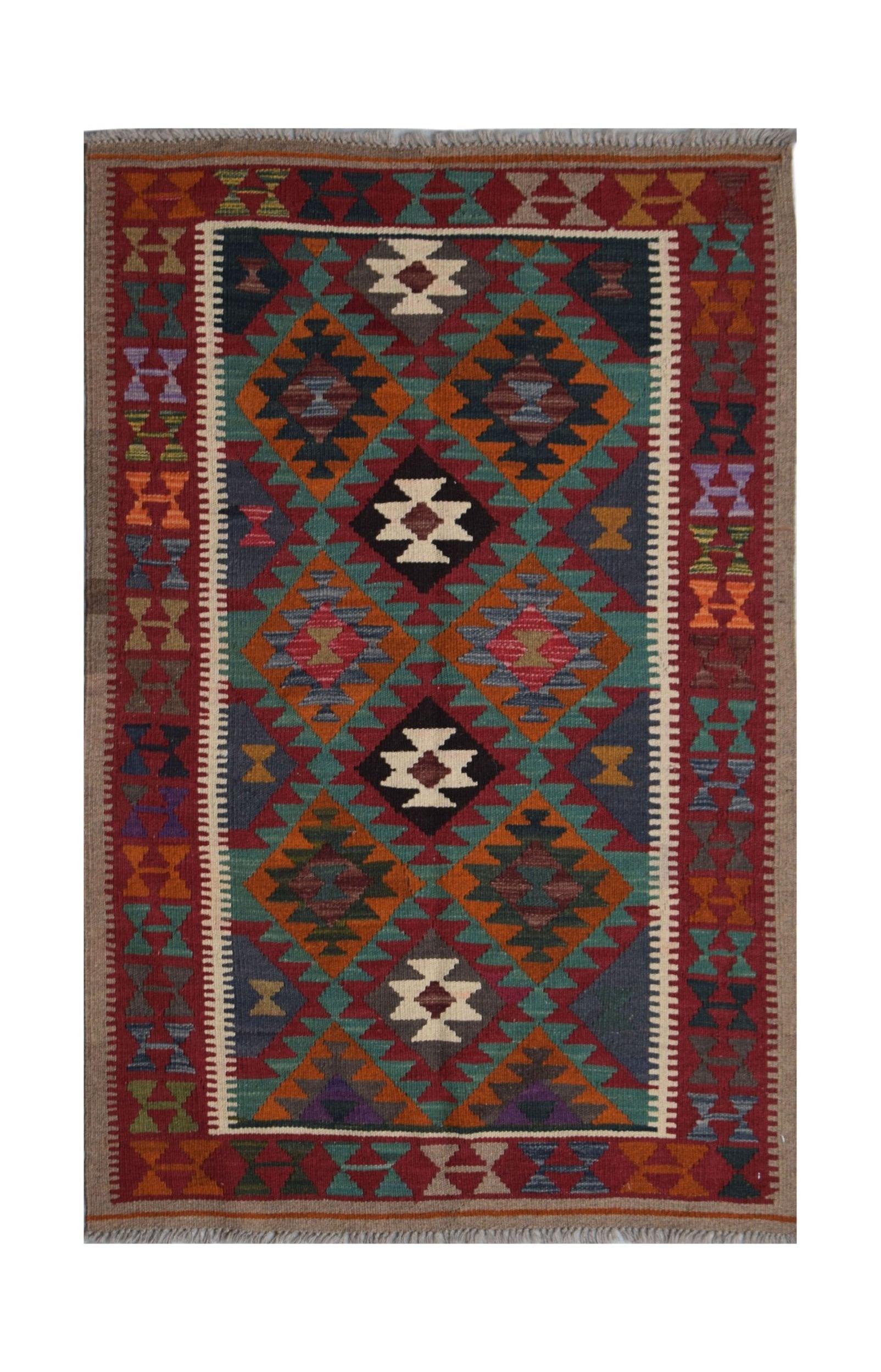 Handwoven Afghan Maimana kilim rug featuring a colorful geometric diamond pattern in wool.