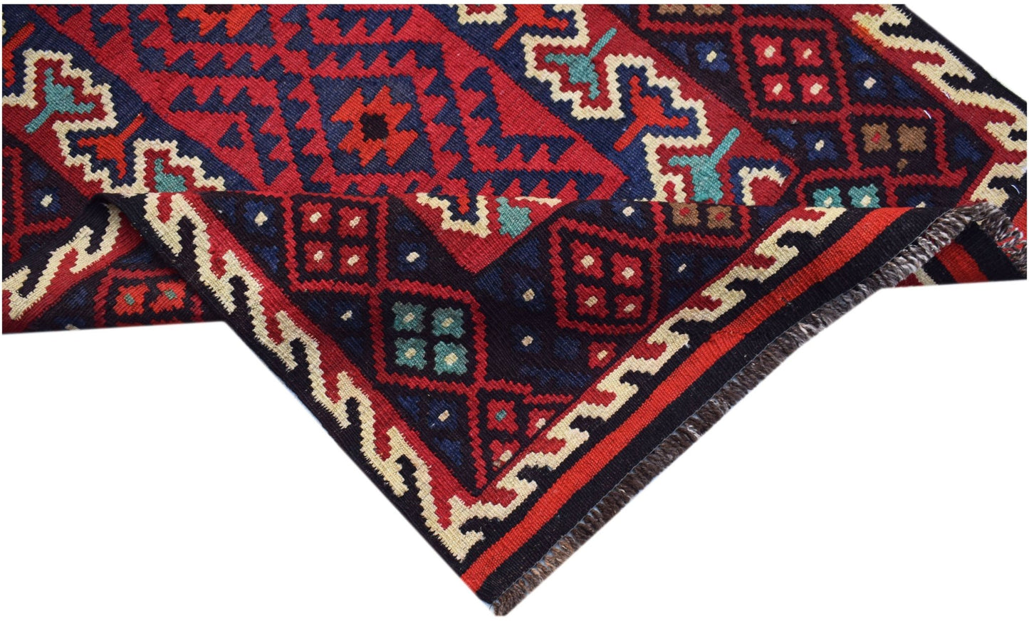 Handwoven Afghan Maimana kilim rug featuring geometric patterns in red, blue, and cream wool.
