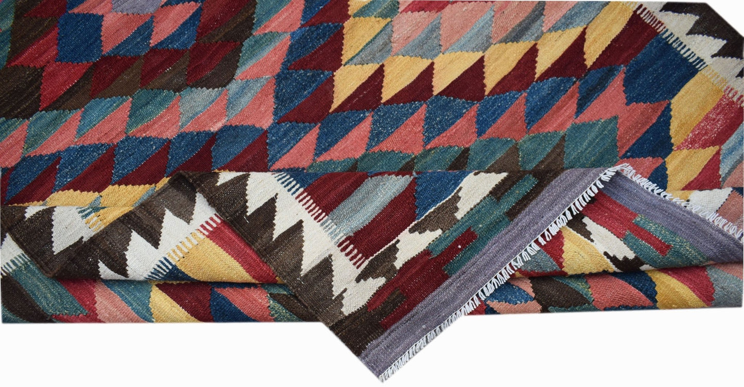 Handwoven Afghan Maimana kilim featuring a colorful geometric diamond pattern in wool.