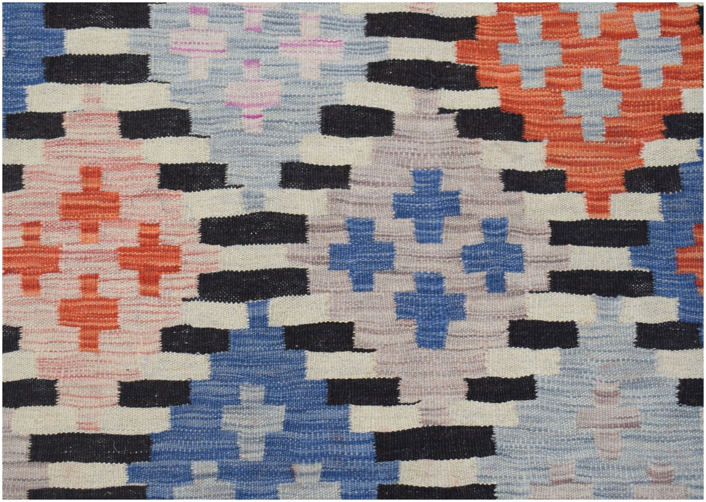 Handwoven Afghan Maimana kilim featuring a colorful geometric pattern in wool.