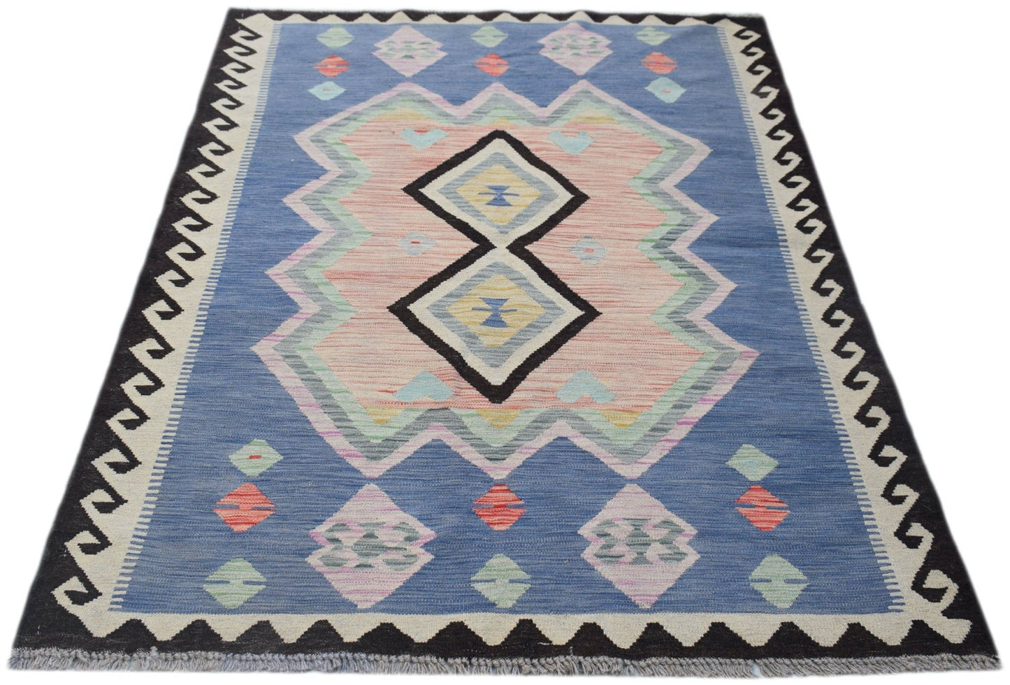 Handwoven Afghan Maimana kilim rug featuring a blue field with geometric pink and diamond patterns.
