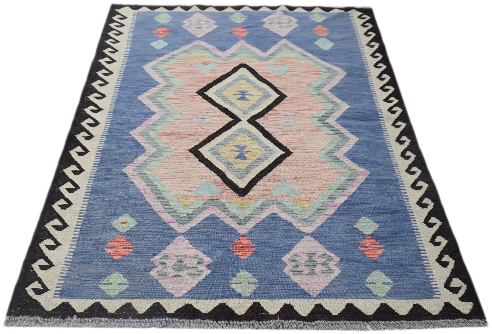 Handwoven Afghan Maimana kilim rug featuring a blue field with geometric pink and diamond patterns.