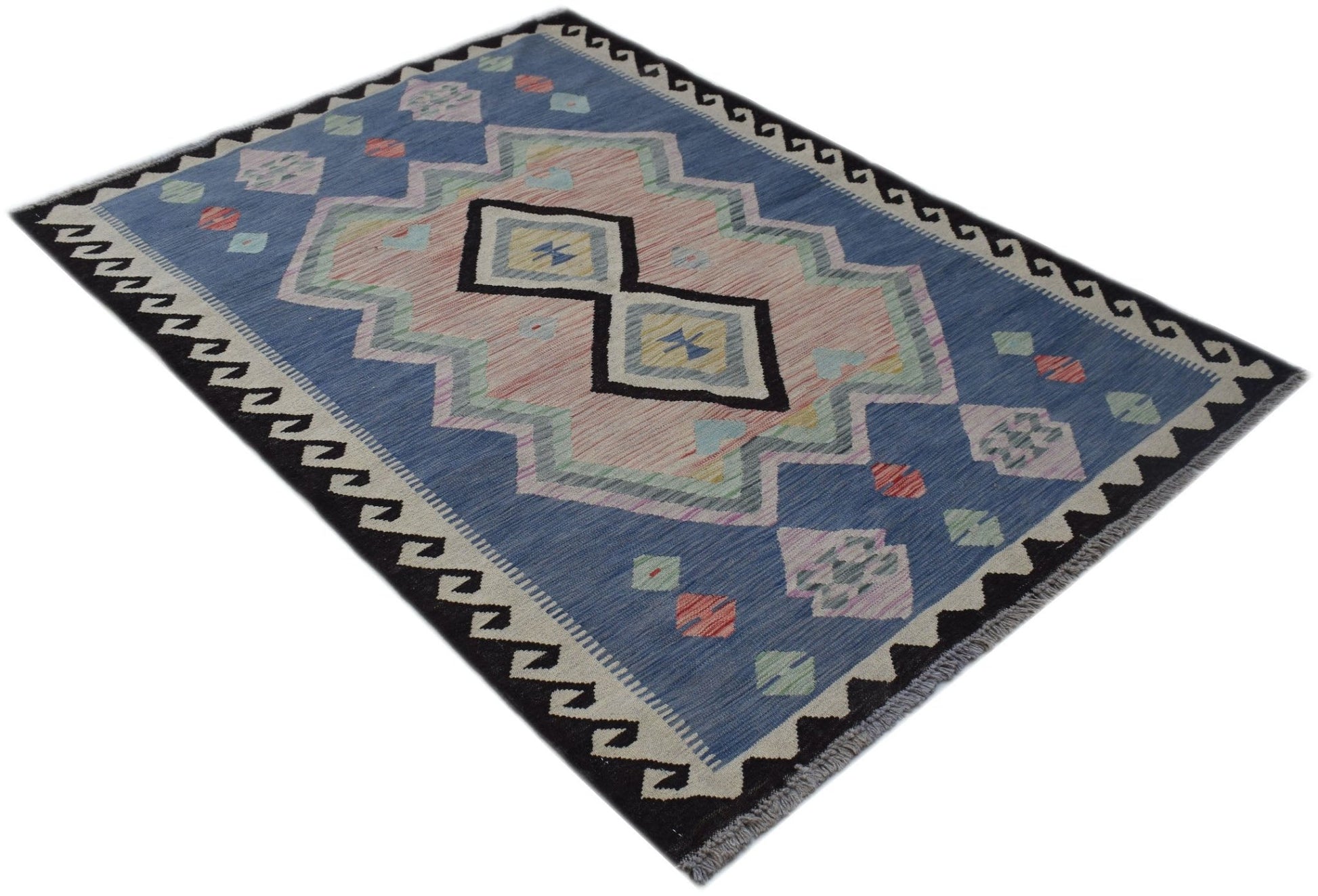 A handmade Afghan Maimana kilim rug featuring a blue field with geometric patterns in wool.