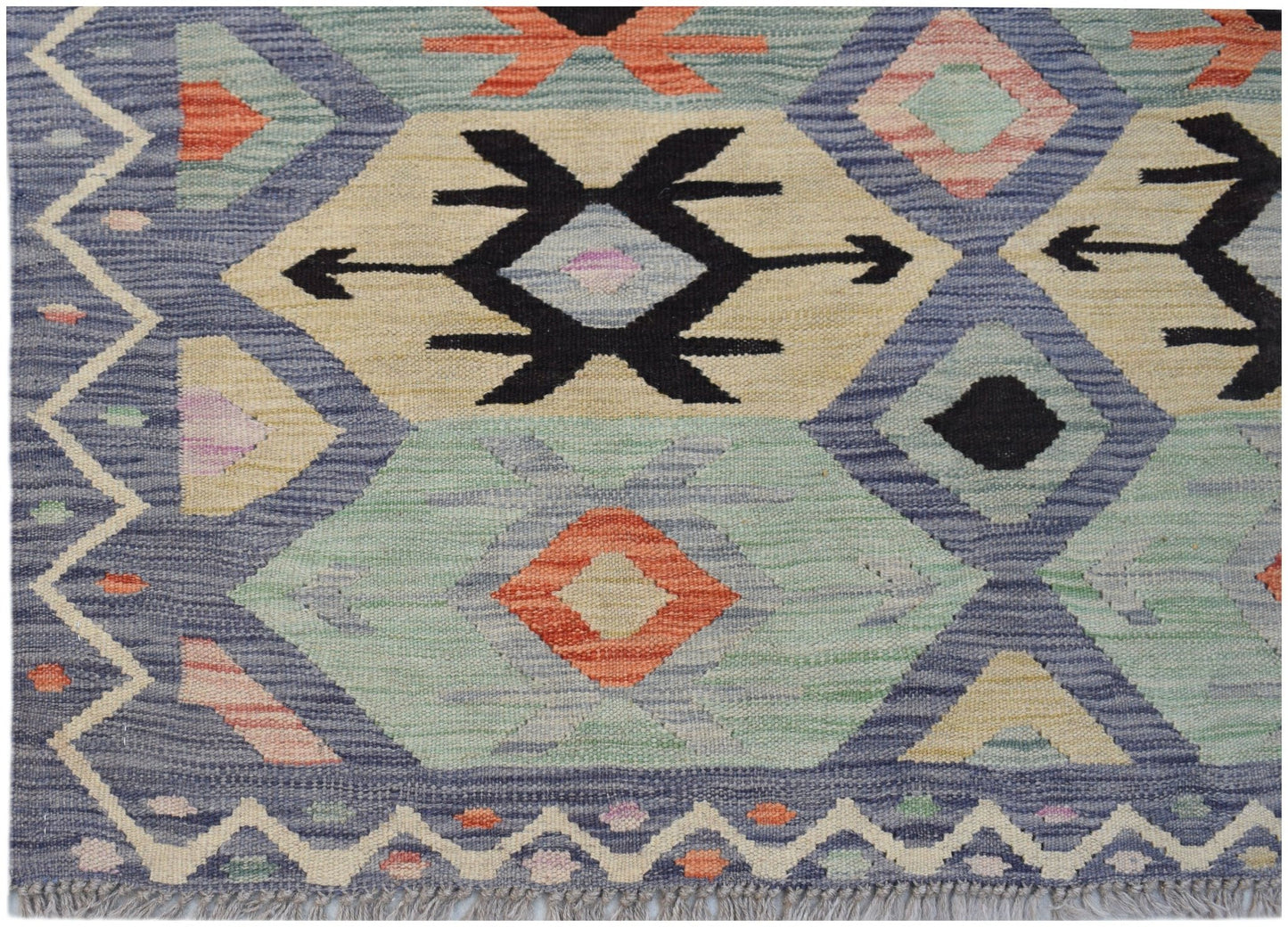 Handwoven Afghan Maimana kilim featuring a geometric pattern in blue, cream, and orange tones.