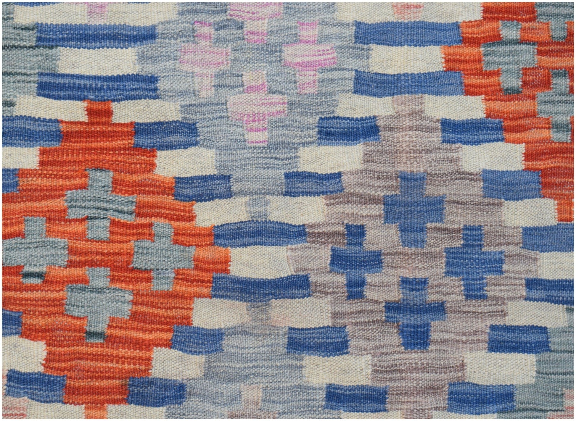 Handwoven Afghan Maimana kilim rug featuring a geometric pattern in orange, blue, and grey tones.