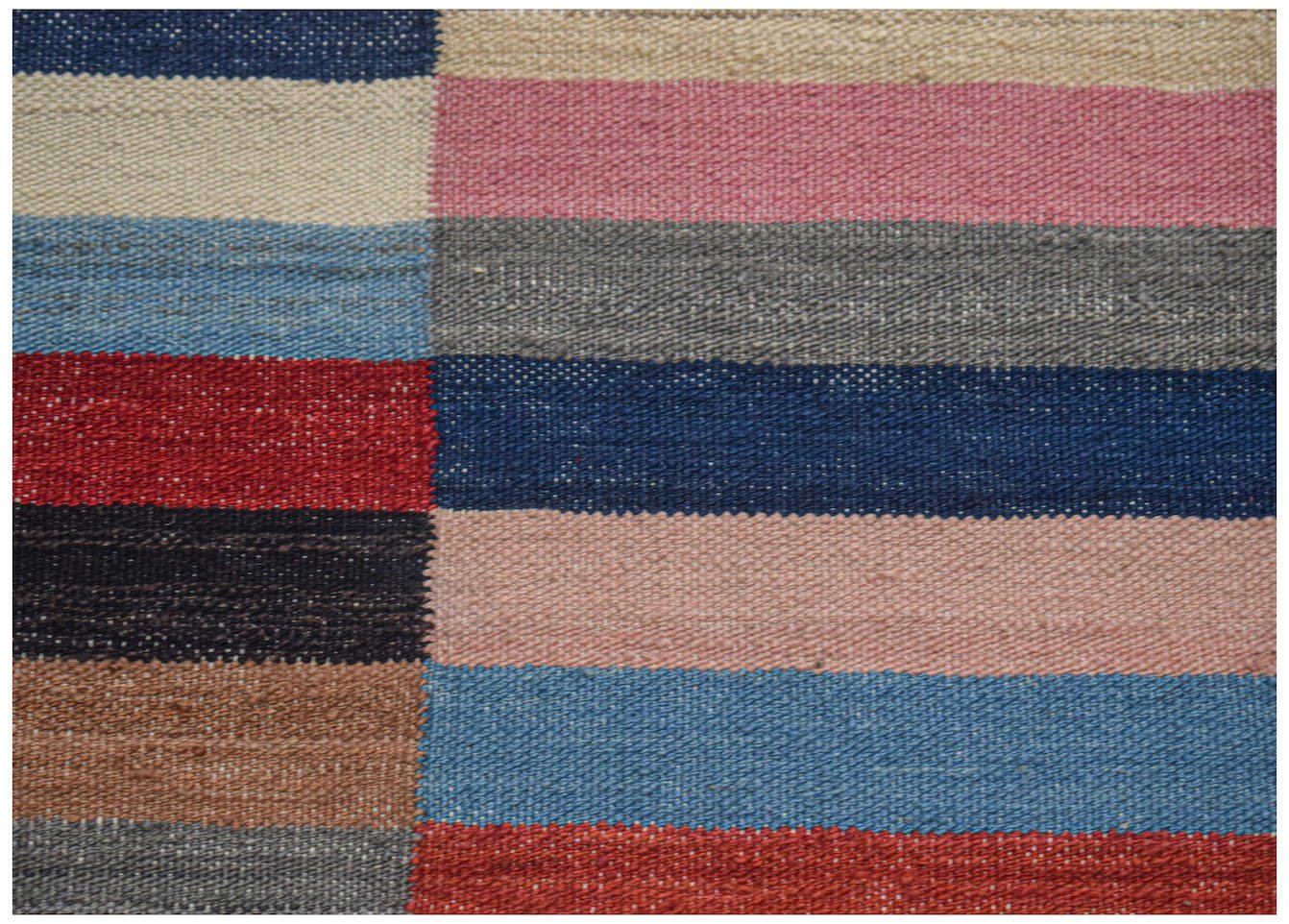 Handwoven Afghan Maimana kilim featuring a colorful striped pattern in wool.