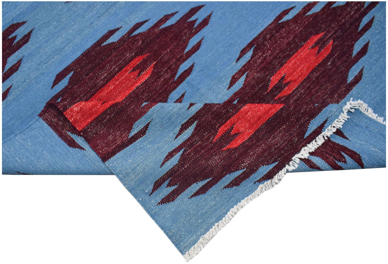 Handwoven Afghan Maimana kilim featuring a blue background with geometric maroon and red patterns.