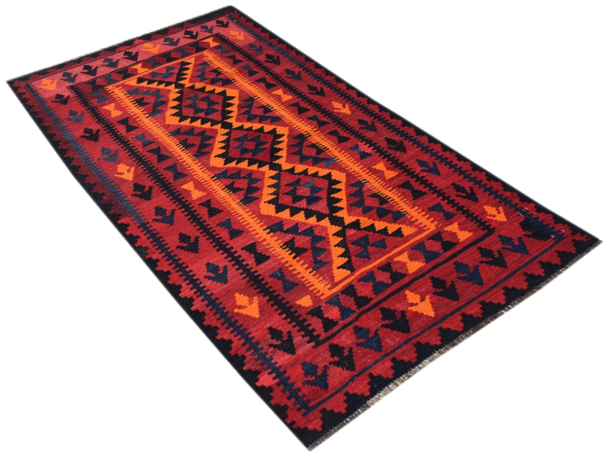 Handwoven Afghan Maimana kilim rug featuring a geometric pattern in red, orange, and dark blue.
