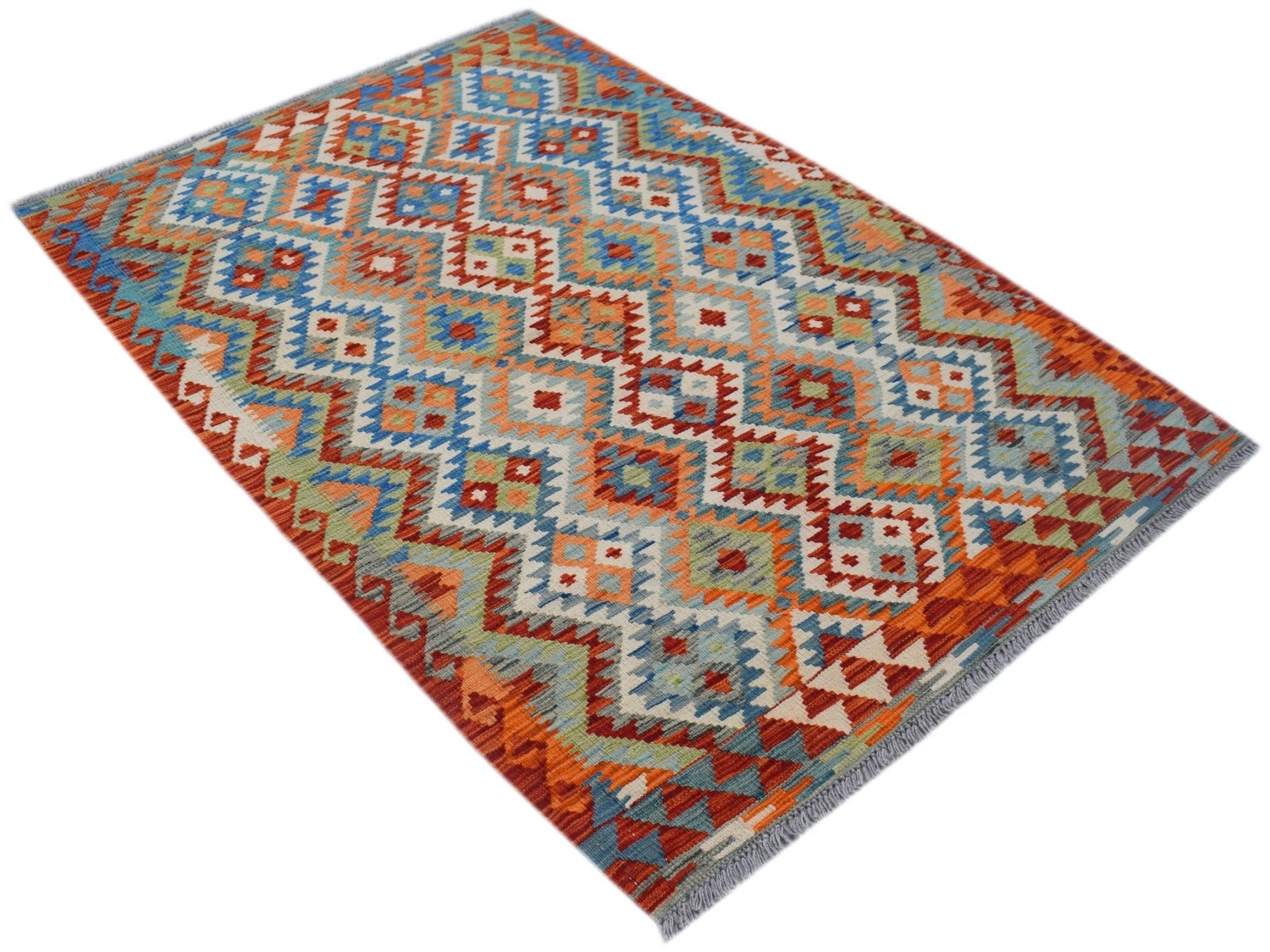 A handmade Afghan Maimana kilim rug featuring a vibrant geometric pattern in wool.