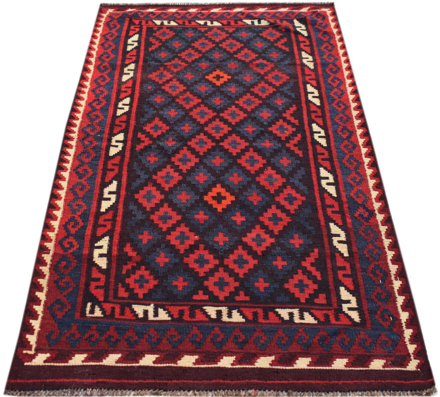 Handwoven Afghan Maimana kilim rug featuring a geometric diamond pattern in red and blue wool.