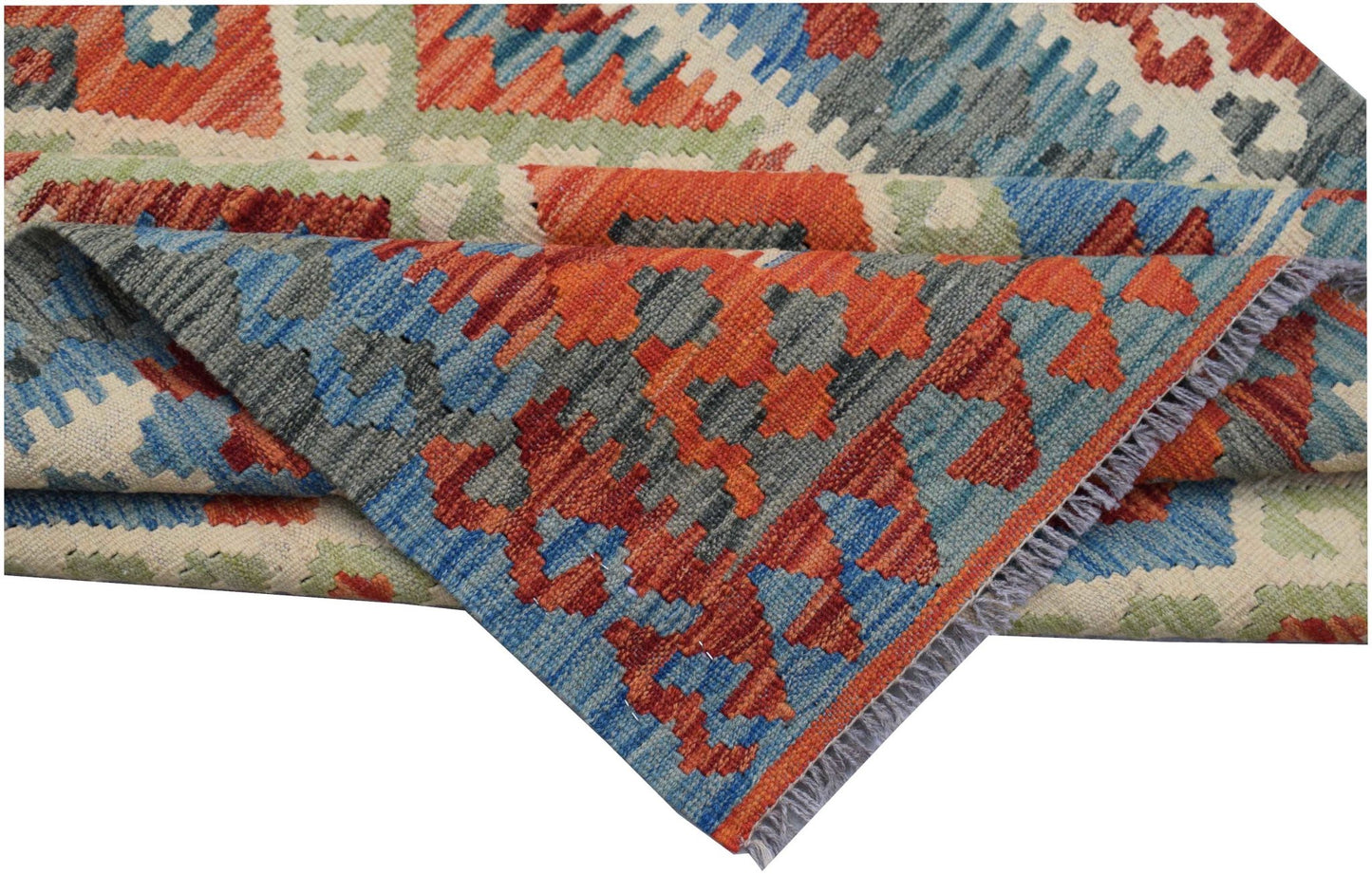 A handwoven Afghan Maimana kilim rug featuring a geometric pattern in red, blue, and green wool.