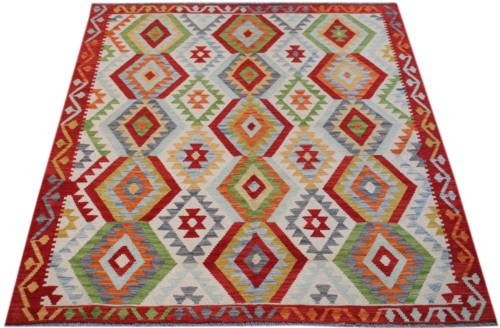 Handwoven Afghan Maimana kilim rug featuring a colorful geometric diamond pattern.