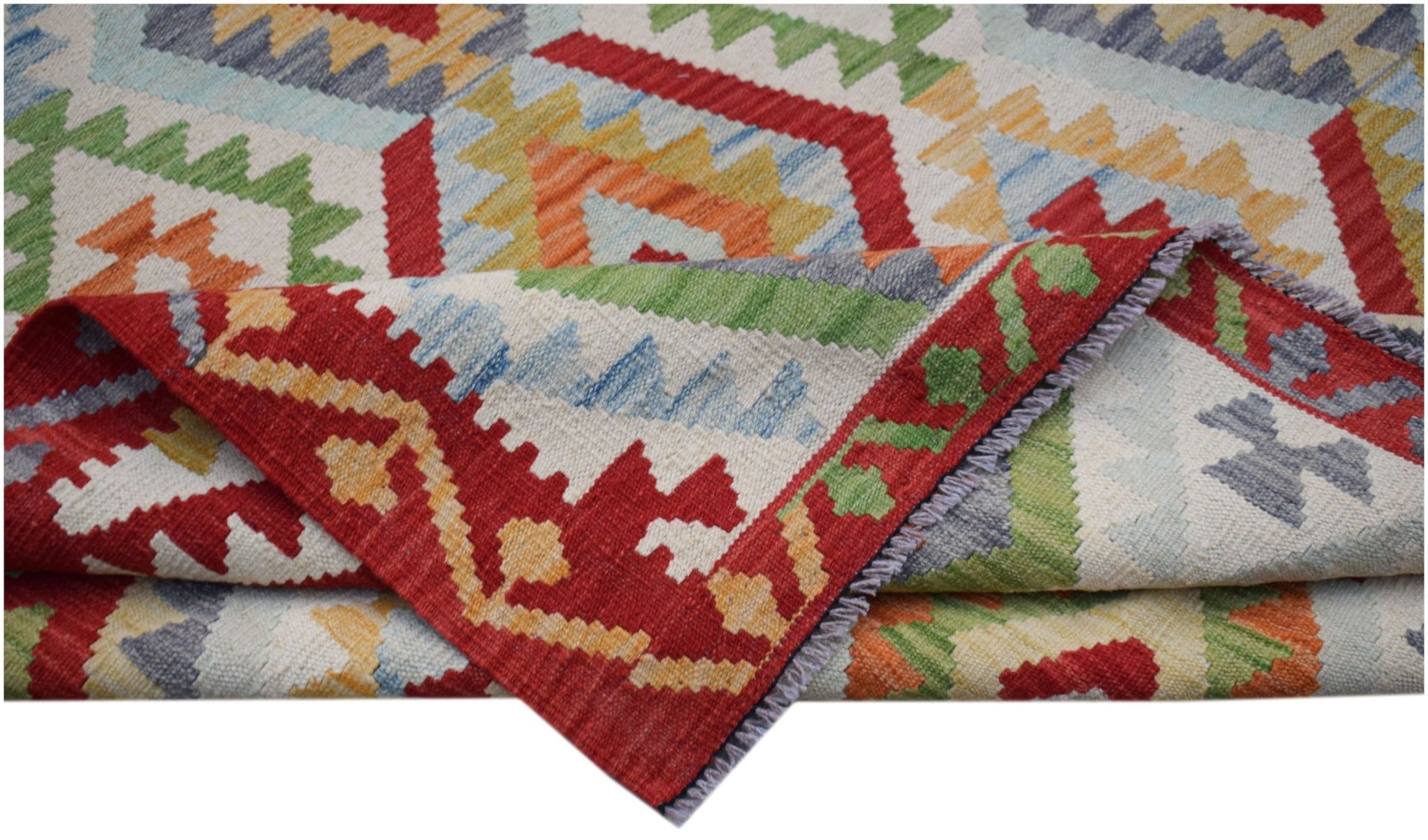 A handmade Afghan Maimana kilim rug featuring a colorful geometric pattern in a flatweave style.