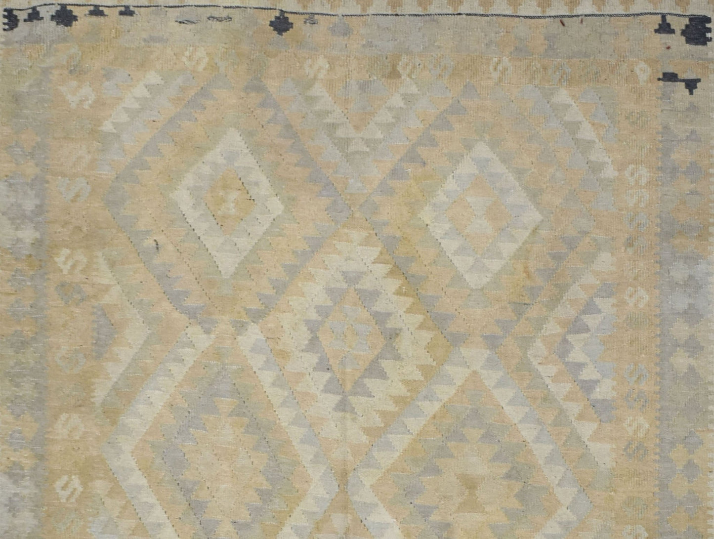 Handmade Afghan Maimana kilim rug featuring a geometric diamond pattern in neutral tones.