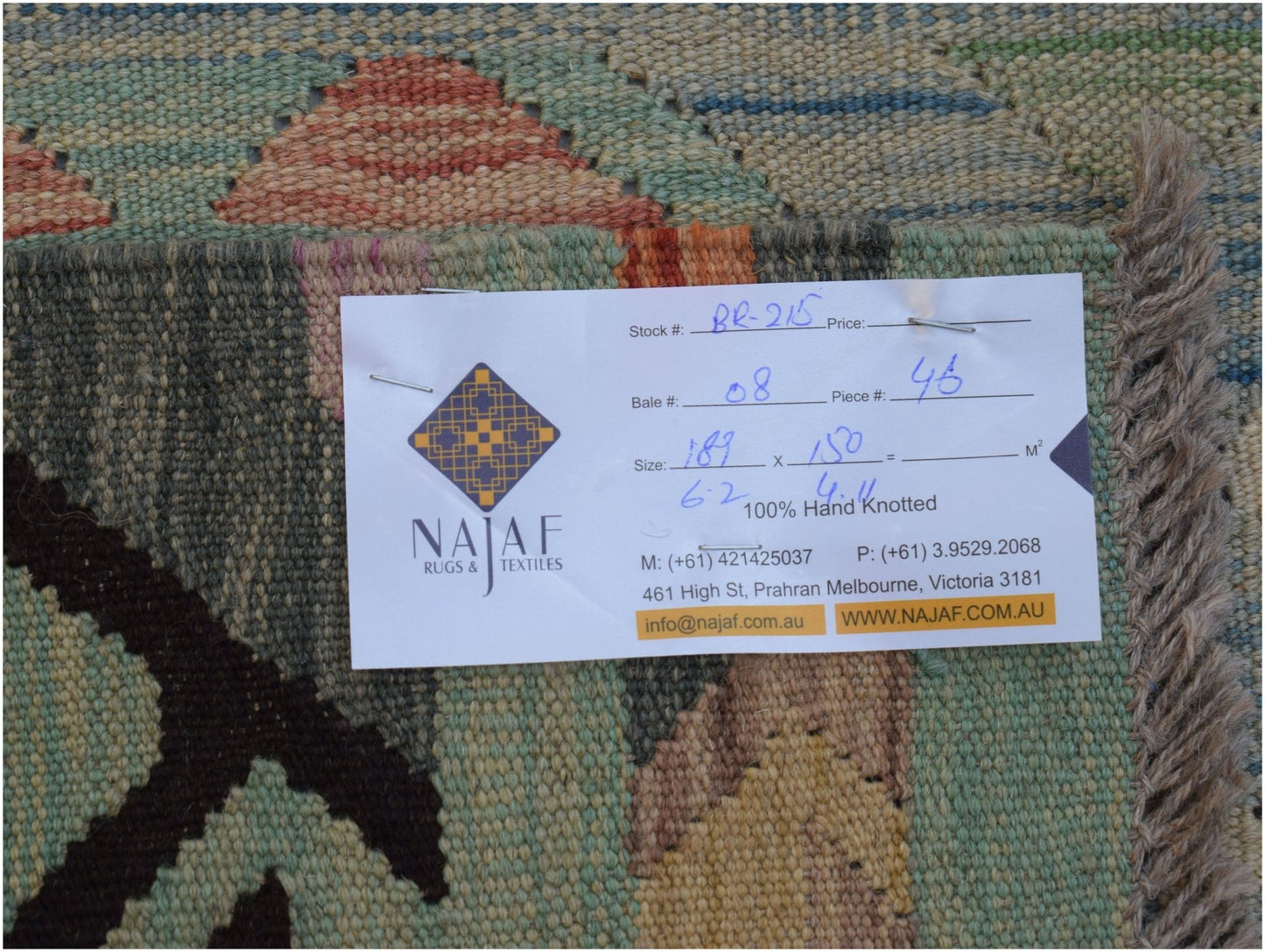 A handmade Afghan Maimana kilim featuring a flatweave texture and geometric patterns.