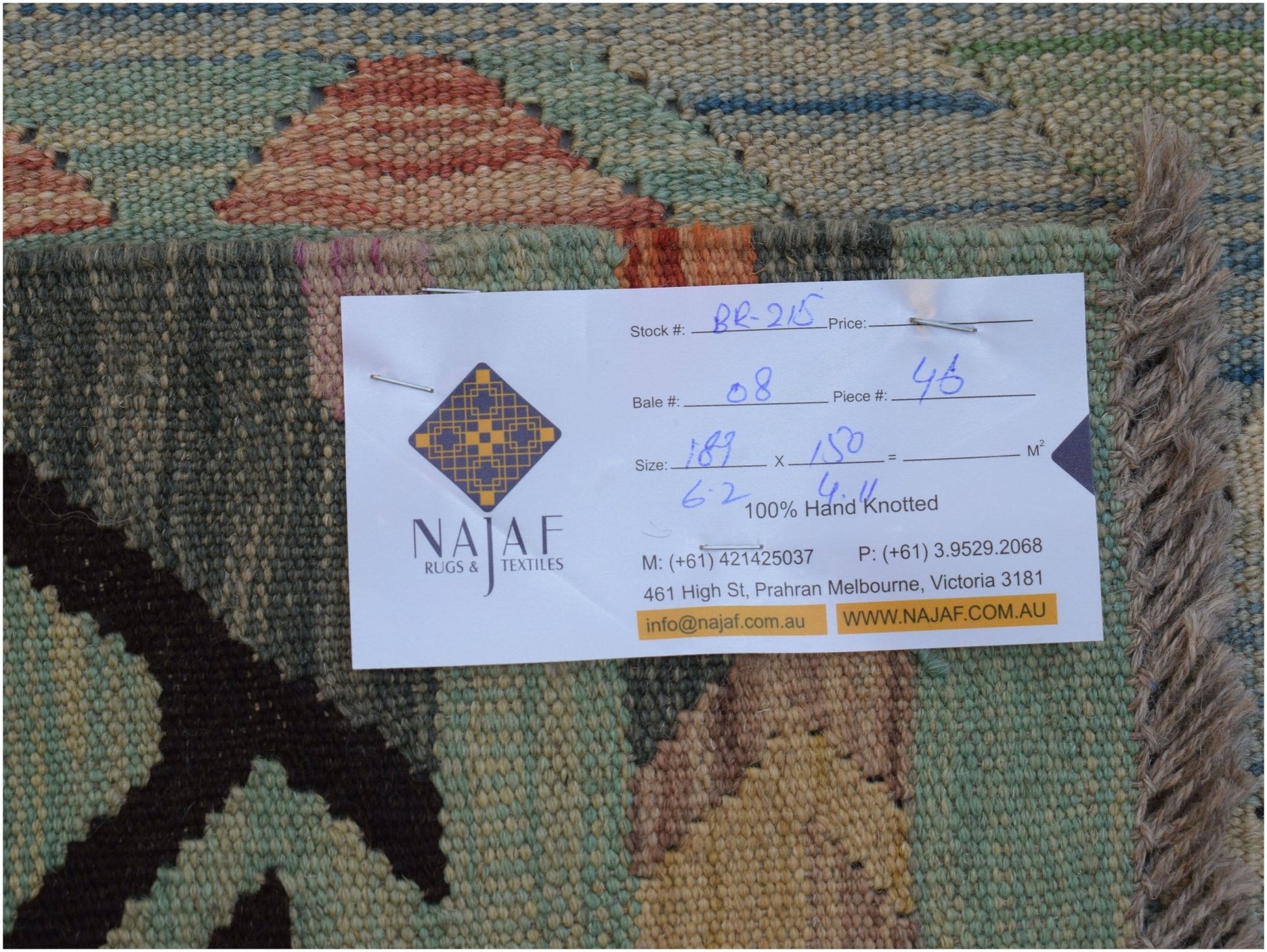 A handmade Afghan Maimana kilim featuring a flatweave texture and geometric patterns.