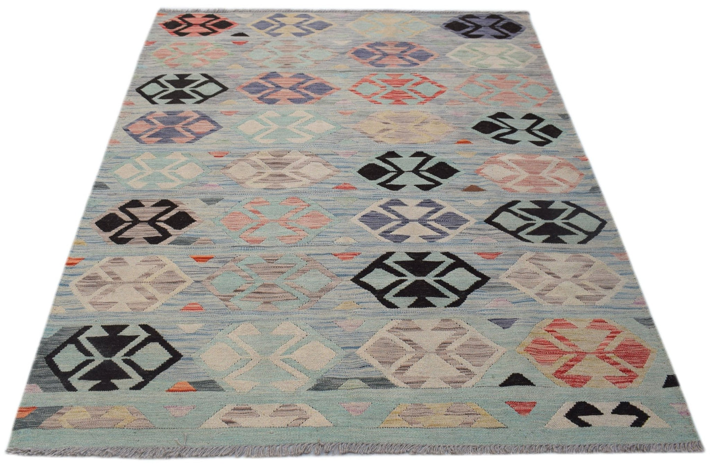 Handwoven Afghan Maimana kilim rug featuring a light blue background with geometric patterns.