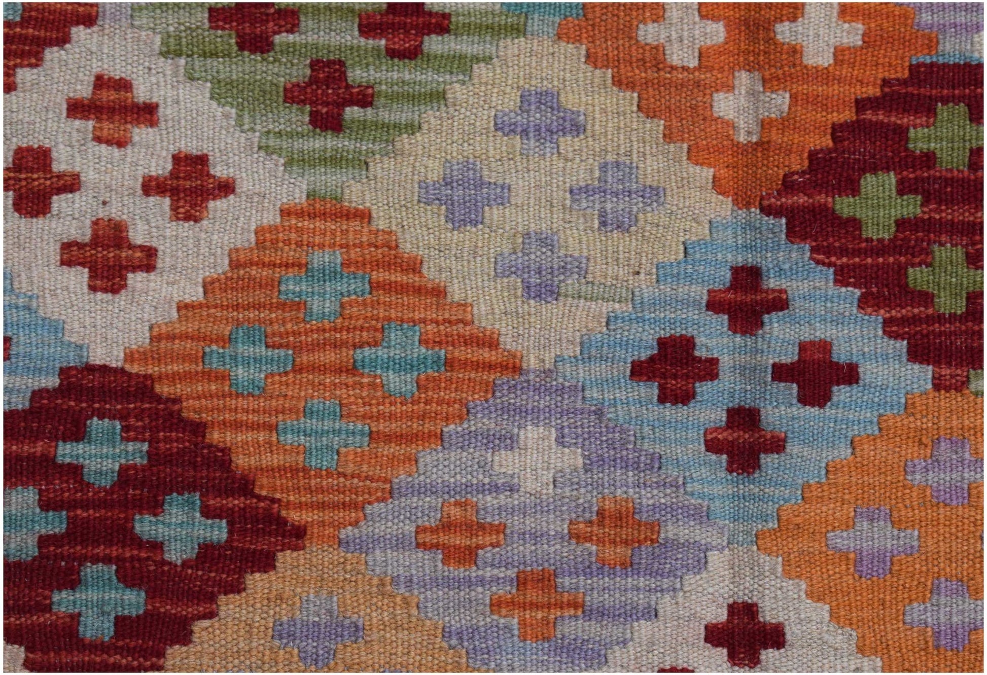 Handwoven Afghan Maimana kilim featuring a colorful geometric diamond pattern in wool.