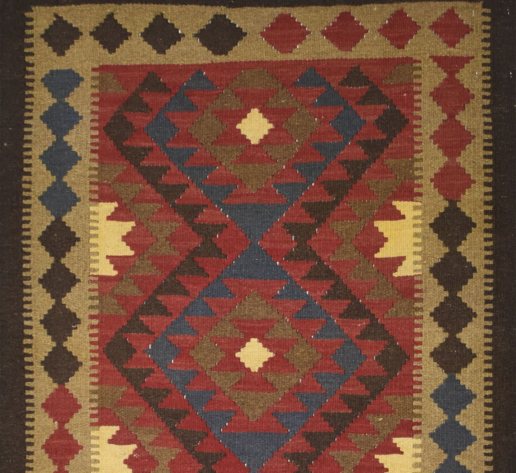 Handmade Afghan Maimana kilim rug featuring a geometric diamond pattern in earthy tones.