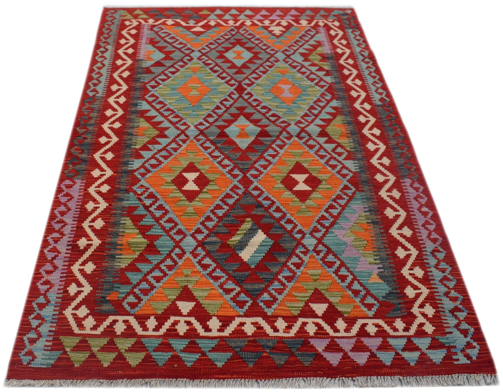 Handwoven Afghan Maimana kilim rug featuring a vibrant geometric pattern in red, orange, and blue.