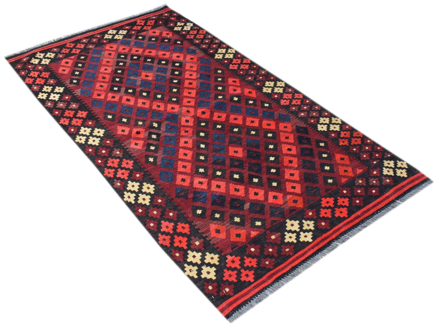 Handwoven Afghan Maimana kilim rug featuring a geometric diamond pattern in red, blue, and black.
