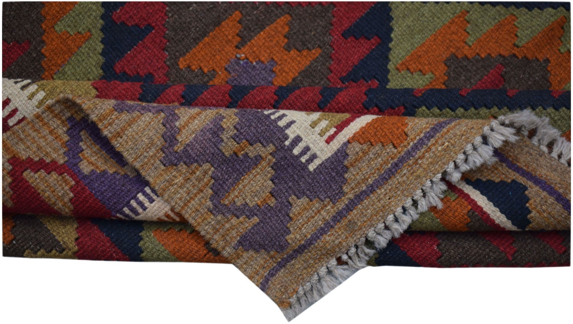 A handwoven Afghan Maimana kilim rug featuring a geometric pattern in rich, multicolored wool.