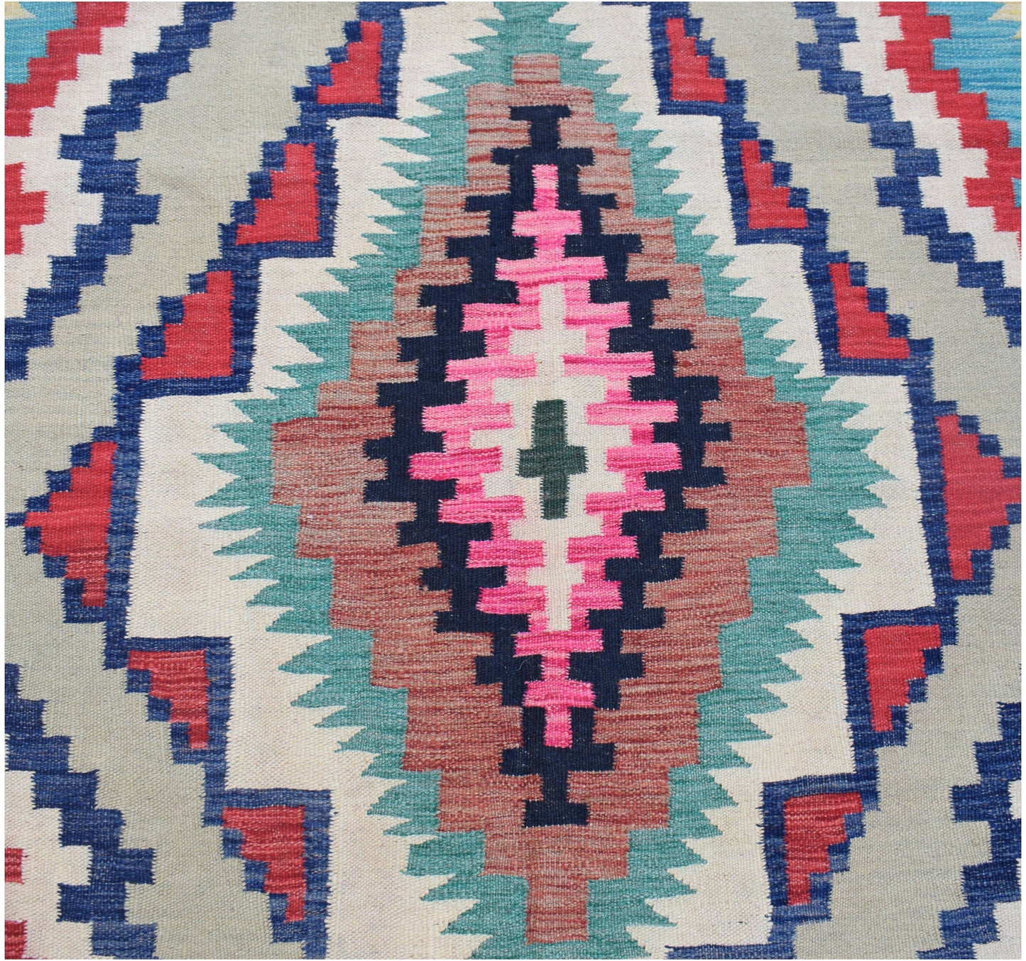 Handwoven Afghan Maimana kilim featuring a geometric diamond pattern in vibrant wool colors.
