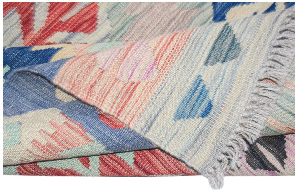 Afghan Maimana Kilim with abstract geometric patterns in blue, red, and cream.