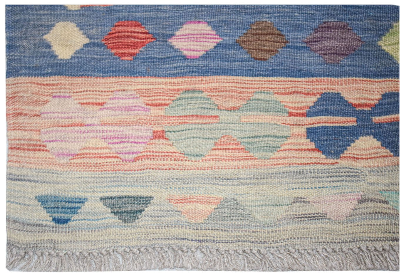 Handwoven Afghan Maimana kilim rug featuring horizontal bands of colorful geometric shapes.