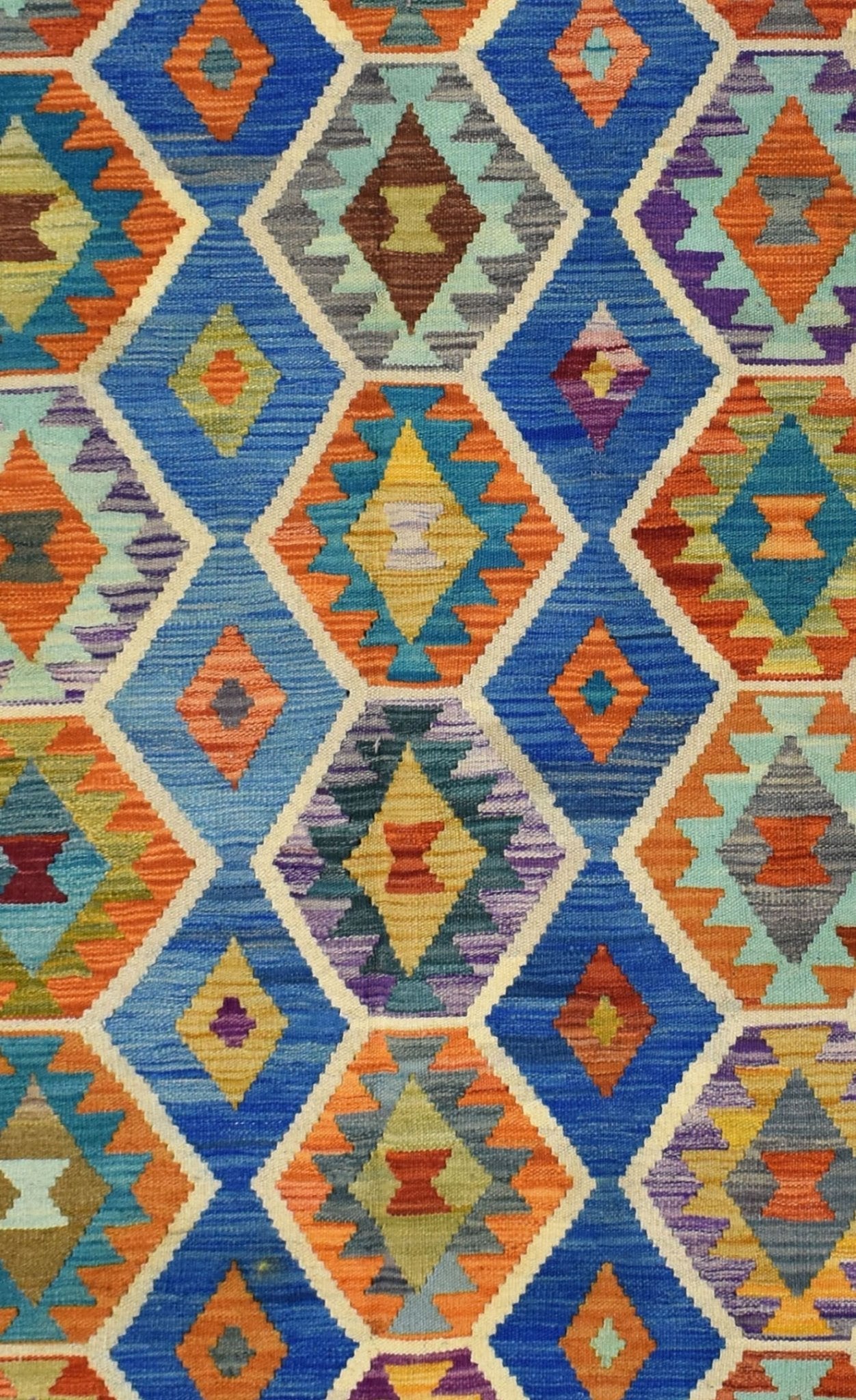 Handmade Afghan Maimana kilim rug featuring a vibrant geometric diamond pattern in wool.