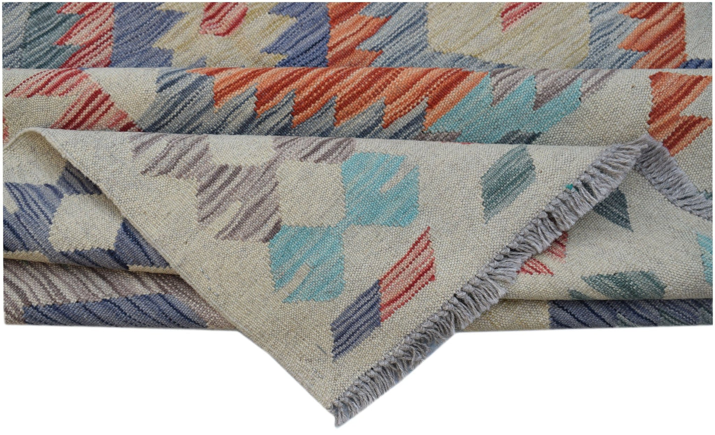 A handmade Afghan Maimana kilim rug featuring a geometric pattern in vibrant wool colors.