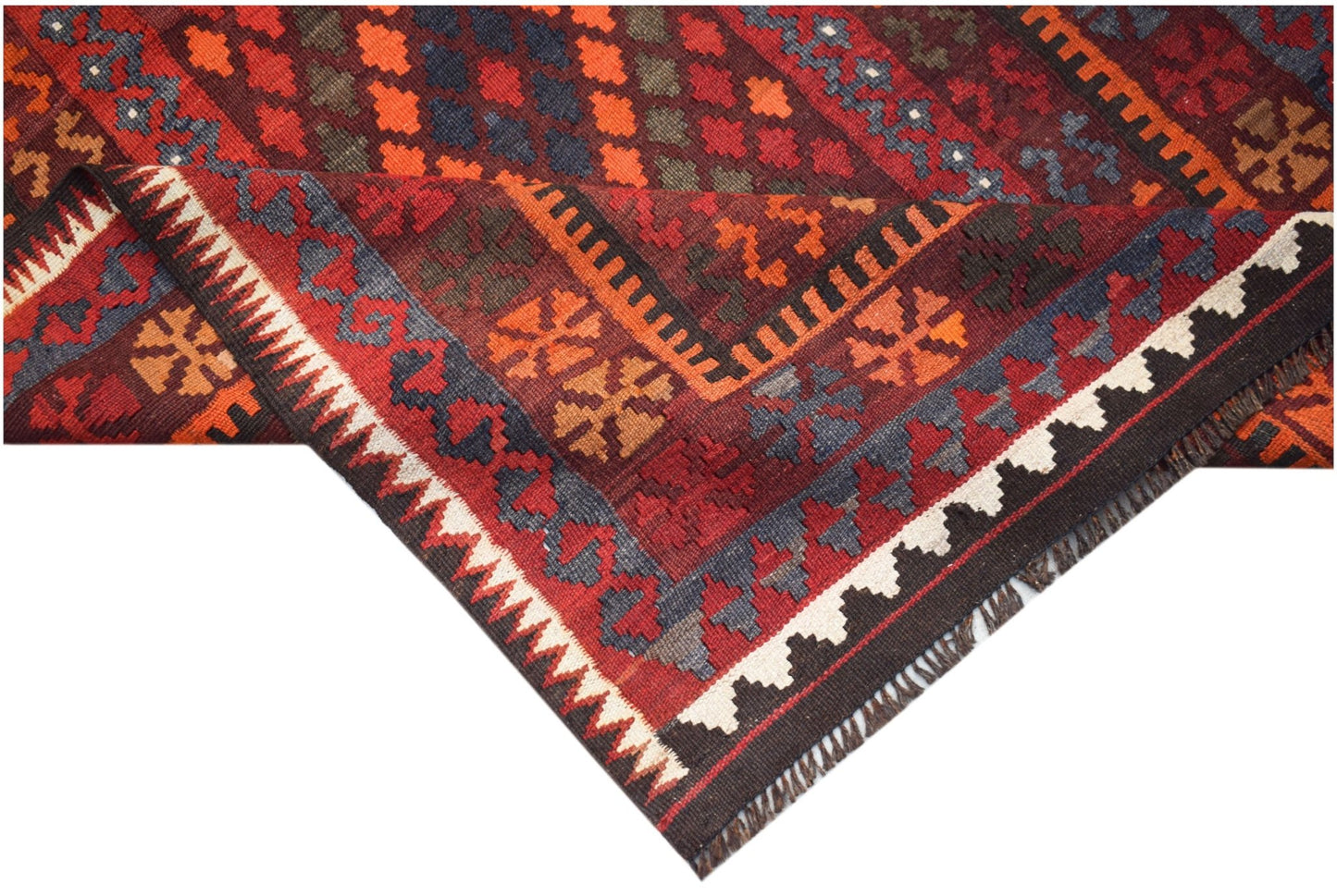 Handwoven Afghan Maimana kilim rug featuring geometric patterns in red, orange, and blue wool.