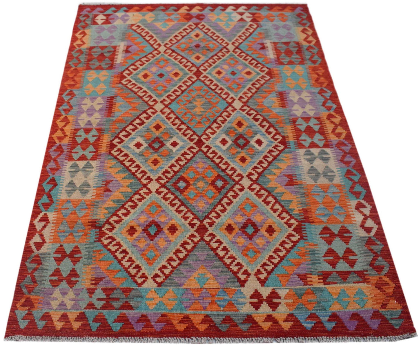 Handwoven Afghan Maimana kilim rug featuring a vibrant geometric diamond pattern in wool.