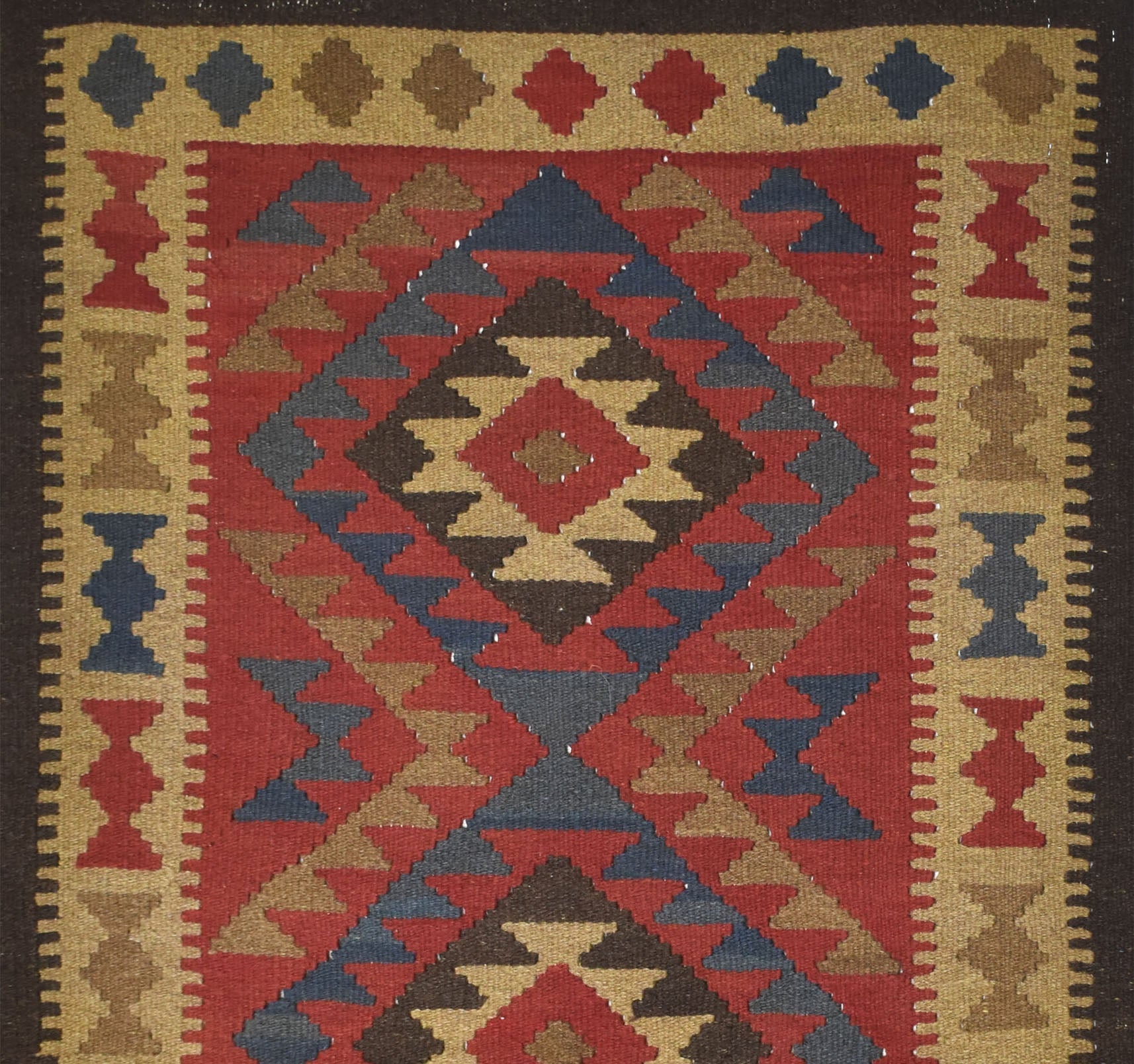 Handmade Afghan Maimana kilim rug featuring a geometric diamond pattern in red, blue, and tan.