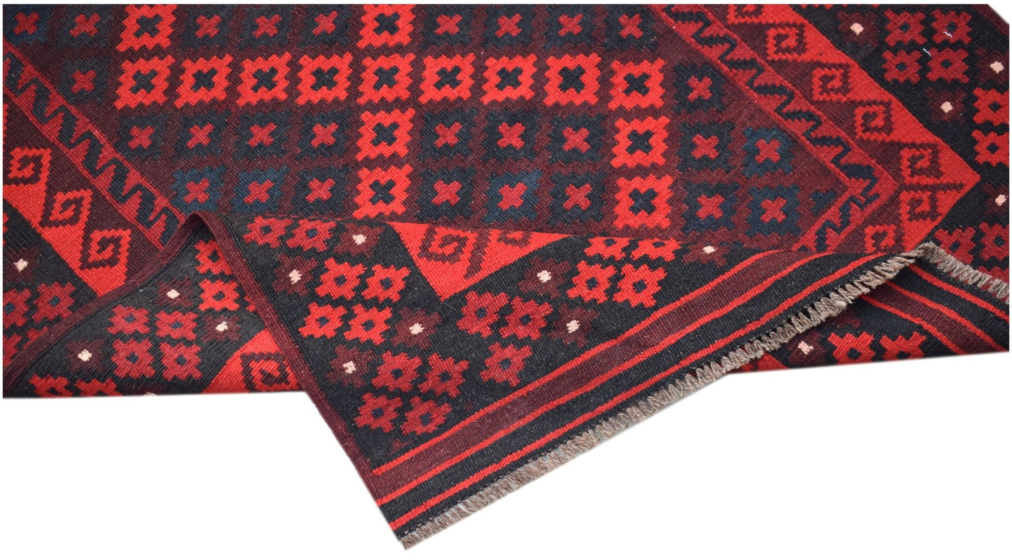 Handwoven Afghan Maimana kilim featuring a geometric red and black pattern with a flat weave.