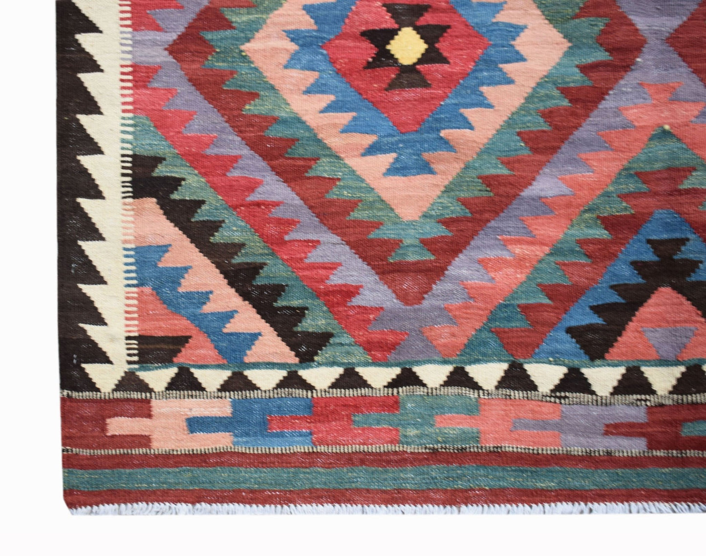 Handwoven Afghan Maimana kilim featuring a geometric diamond pattern in vibrant wool colors.
