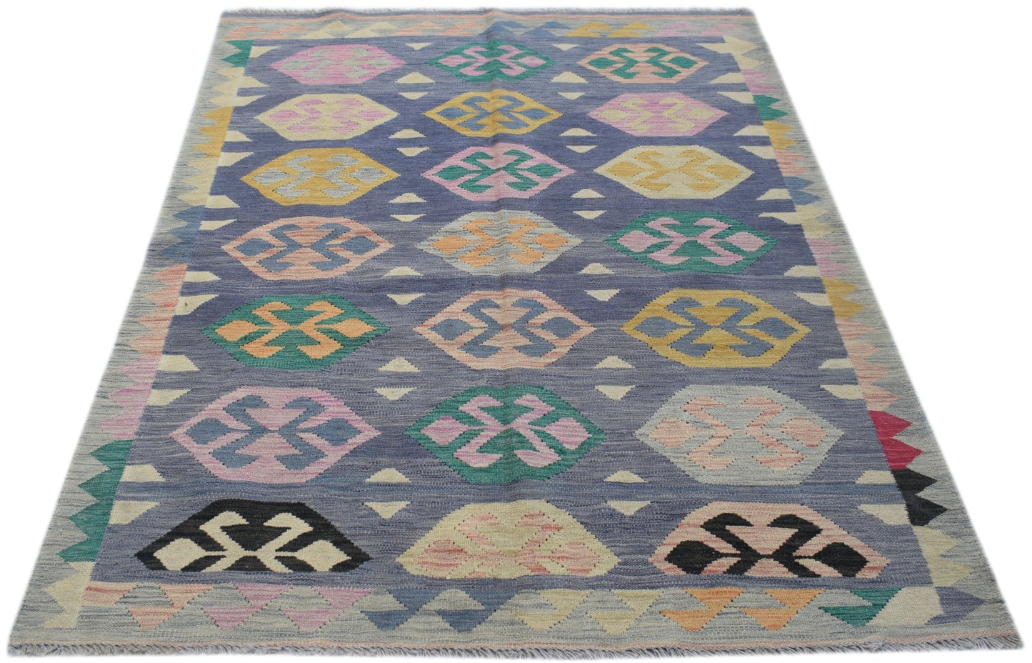 Handwoven Afghan Maimana kilim rug featuring a blue field with colorful geometric patterns.
