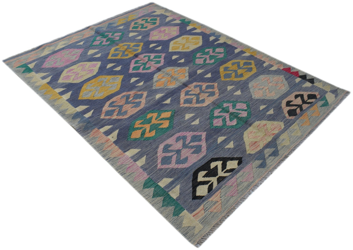 Handwoven Afghan Maimana kilim rug featuring a blue field with colorful geometric patterns.