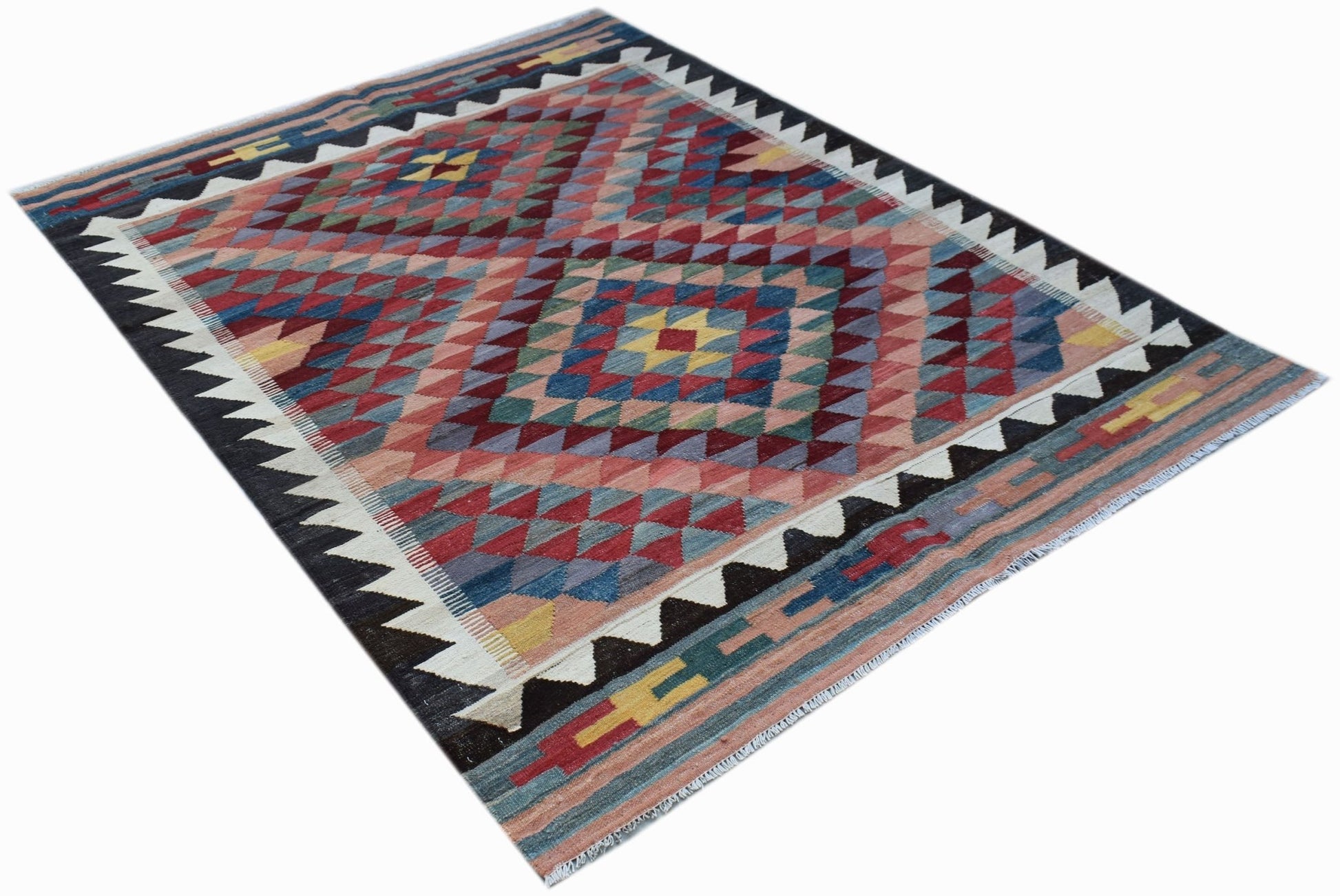 Handwoven Afghan Maimana kilim rug featuring a geometric diamond pattern in multicolored wool.