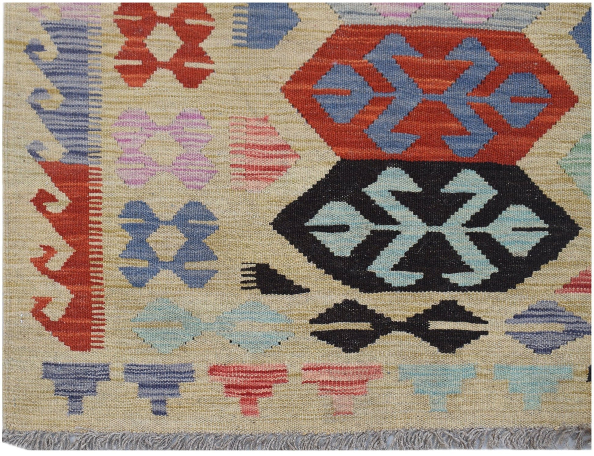 Handwoven Afghan Maimana kilim rug featuring geometric patterns in red, blue, and black wool.