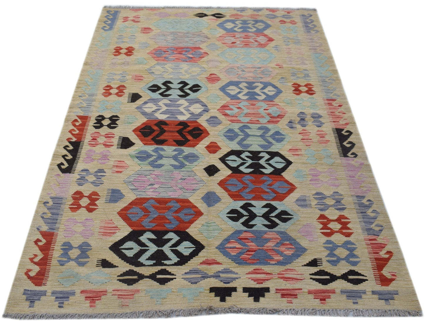 Handwoven Afghan Maimana kilim rug featuring a geometric pattern in red, blue, and black wool.