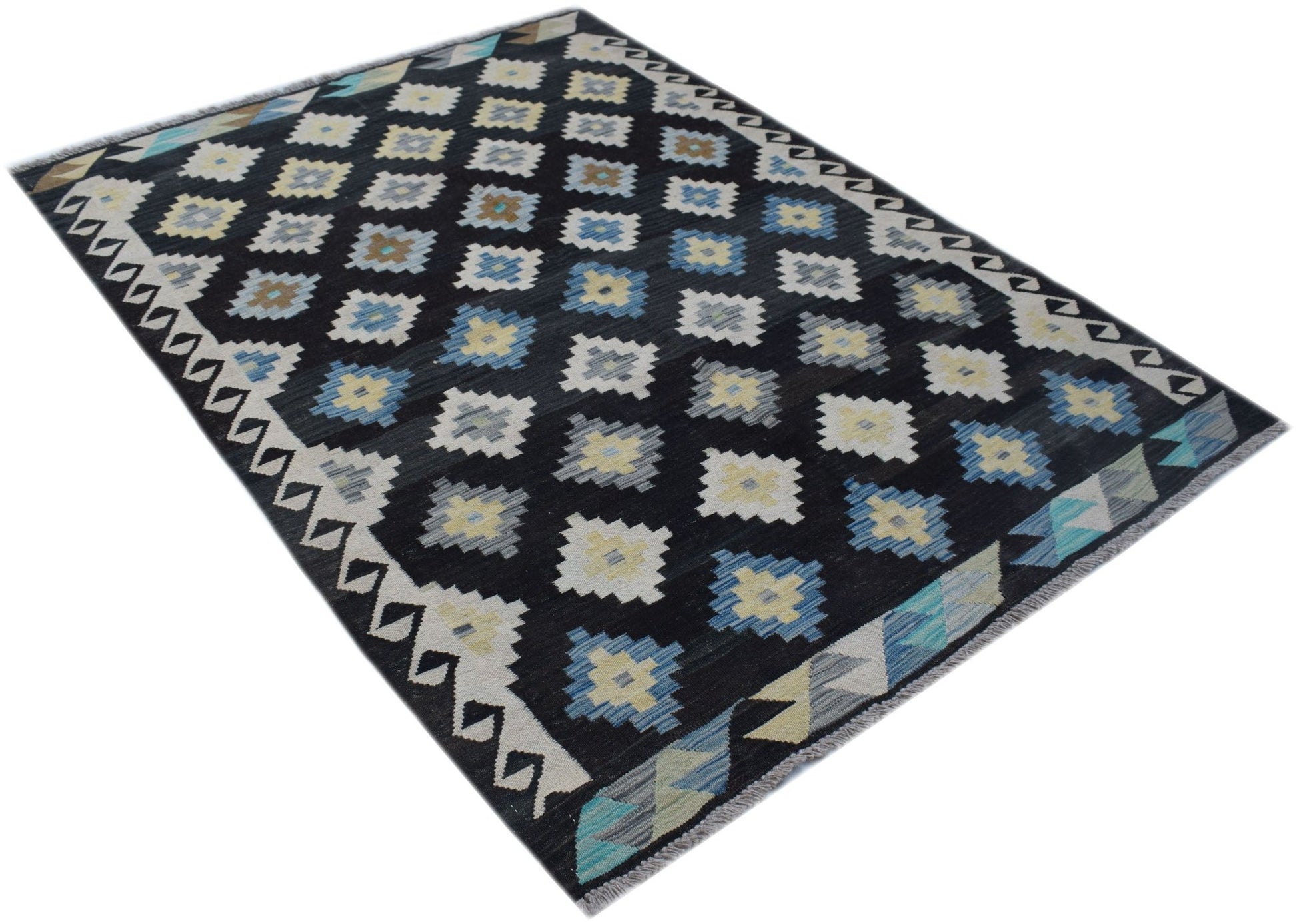 Handwoven Afghan Maimana kilim rug featuring a black field with repeating geometric motifs.