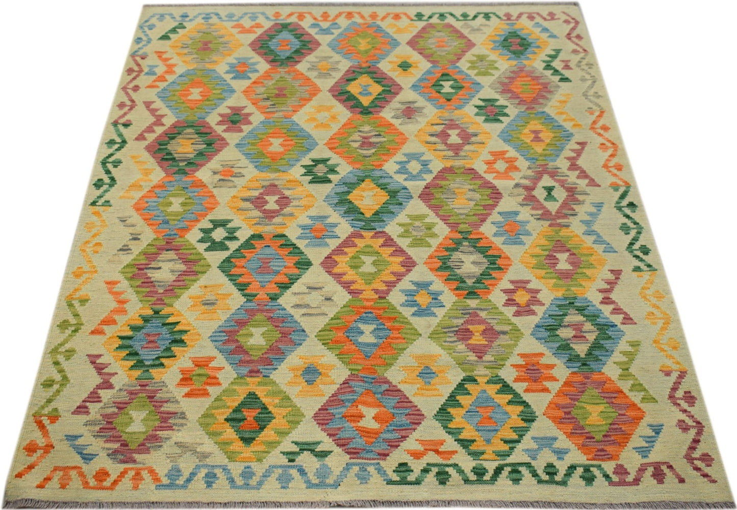 Handmade Afghan Maimana kilim rug featuring a colorful geometric diamond pattern on a light base.