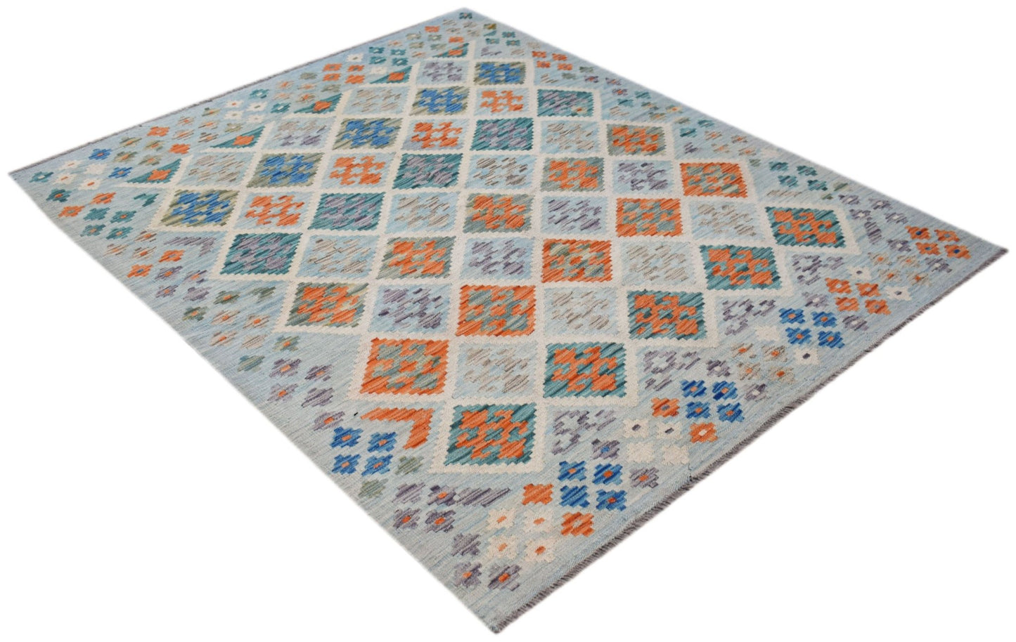 Handwoven Afghan Maimana kilim rug featuring a geometric diamond pattern in blue and orange.