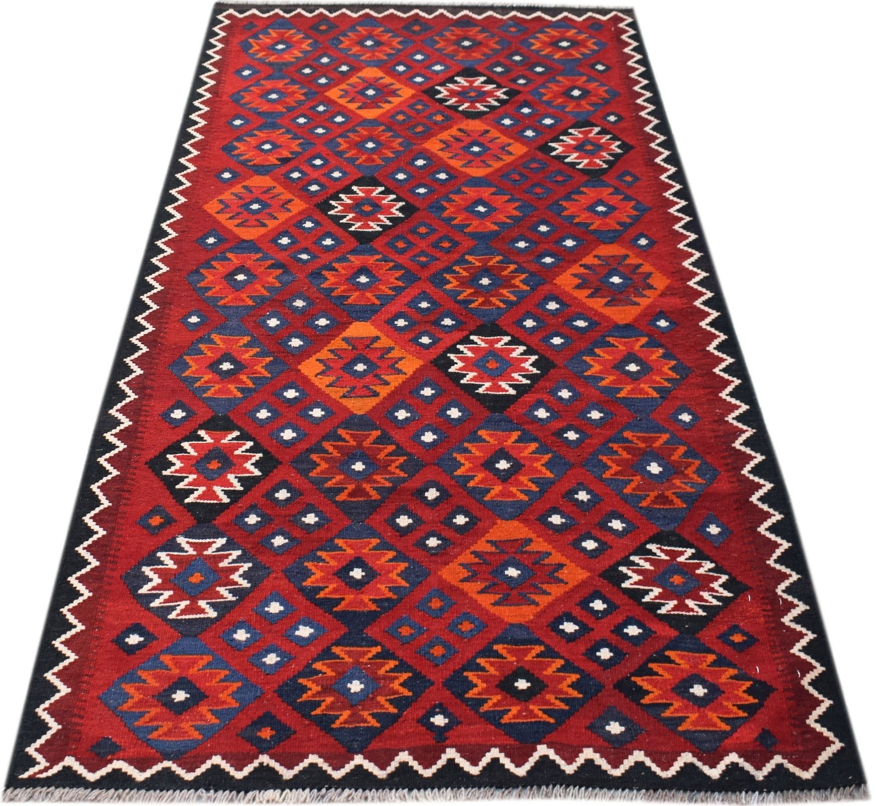 Handwoven Afghan Maimana kilim runner featuring a geometric diamond pattern in red, blue, and orange.