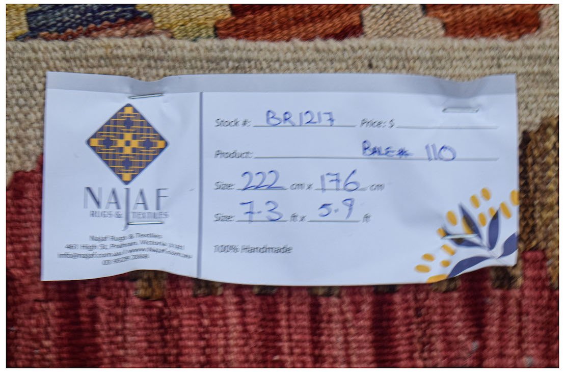 Afghan Maimana Kilim with handwritten label showing dimensions and stock number.